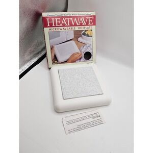 Vintage Heatwave Microwaveable Hotplate designed to keep food warm during meals